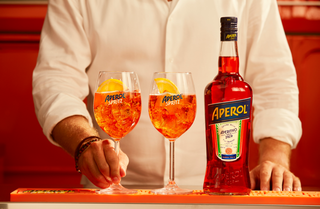 Aperol USA bottle with AS glasses